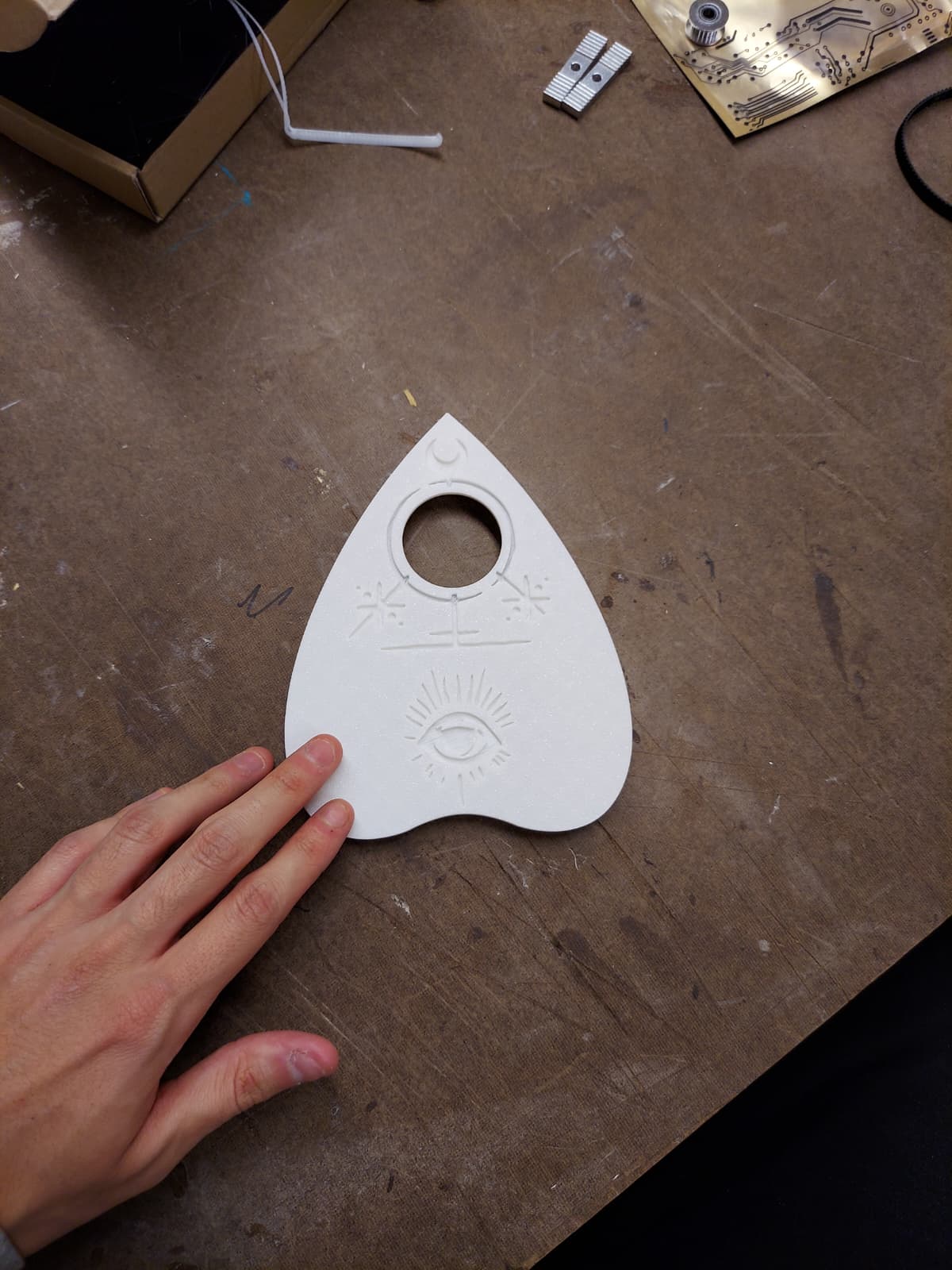 Freshly printed white cursor on the workbench